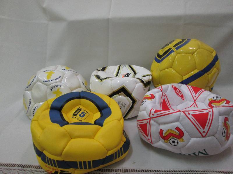 Assorted sports balls colors may va...