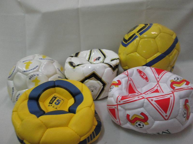 Assorted sports balls colors may va...