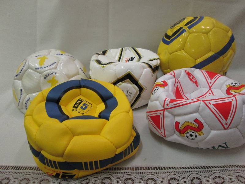 Assorted sports balls colors may va...