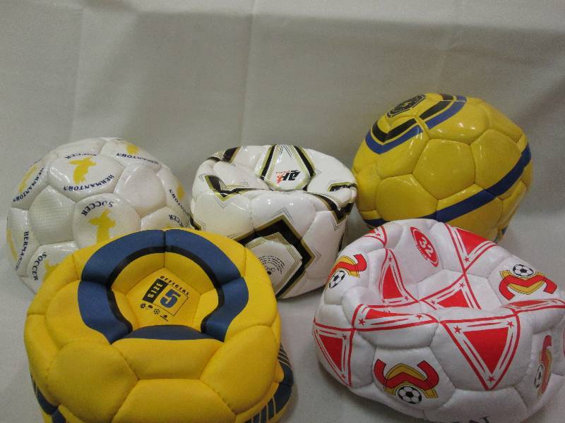 Assorted sports balls colors may va...