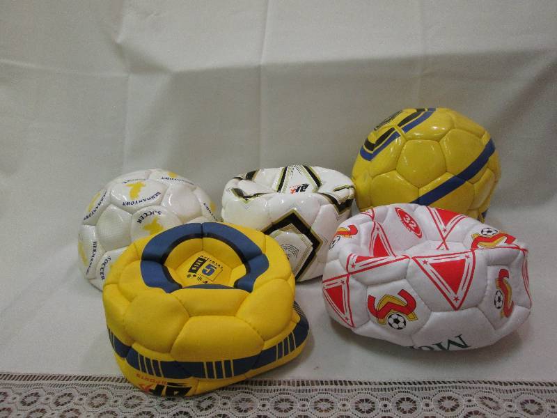 Assorted sports balls colors may va...