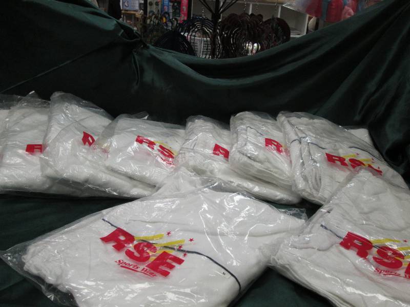 4 shirts and 5 pairs of pants varie...