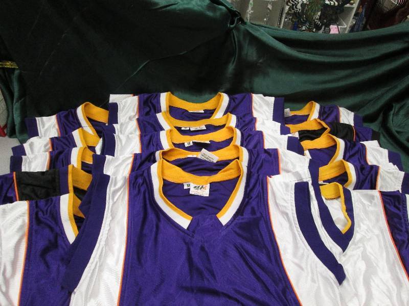 15 sleeveless shirts purple, white,...
