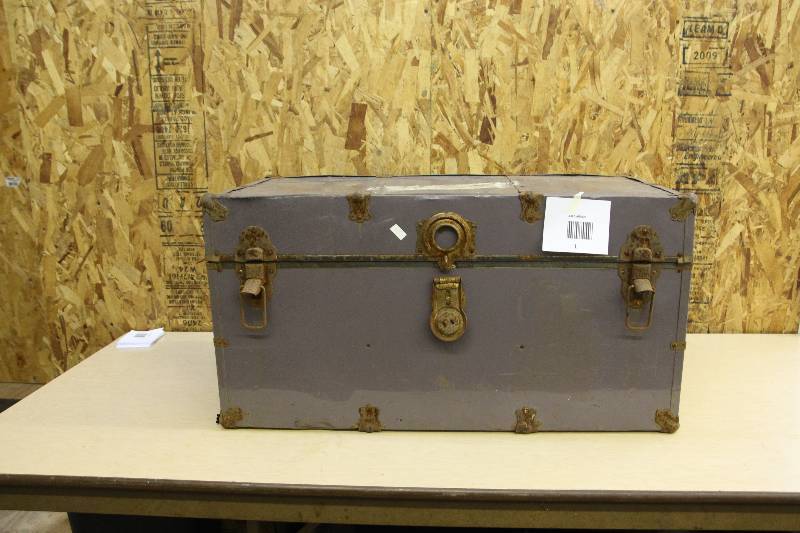 Large grey metal trunk
