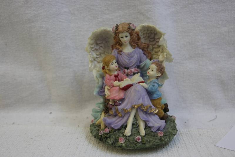 Angelmother with chidren musical figurine