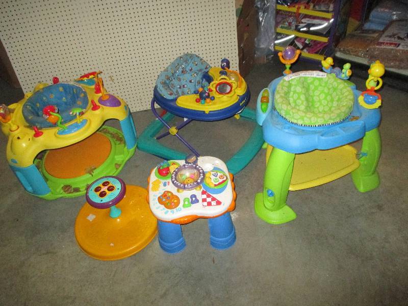 Lot of plastic baby and toddler toys, walker, etc