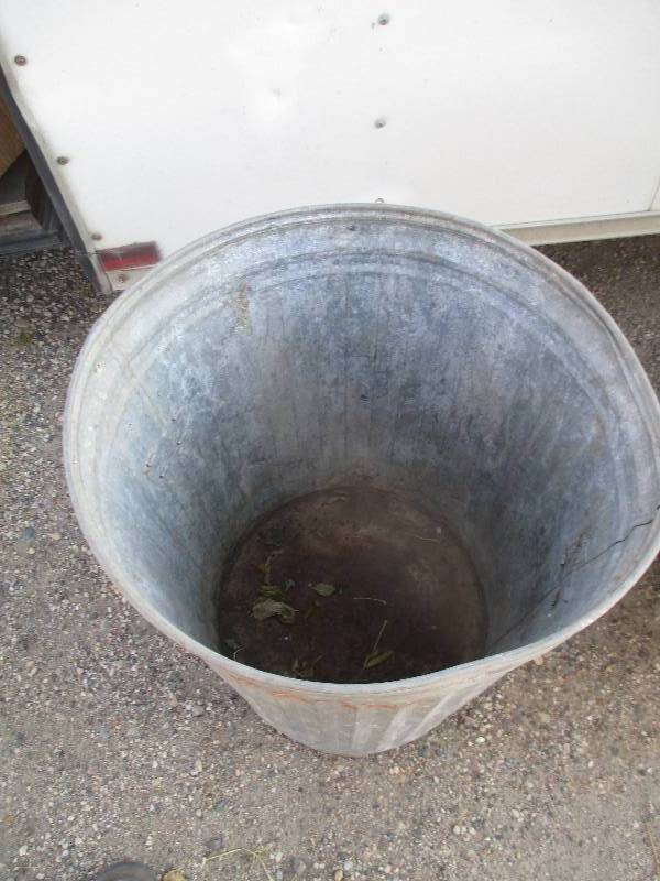 Vintage metal trash can...