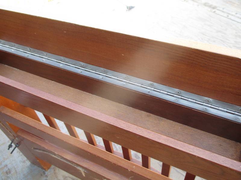 wood cubby, the top is on hinges to...