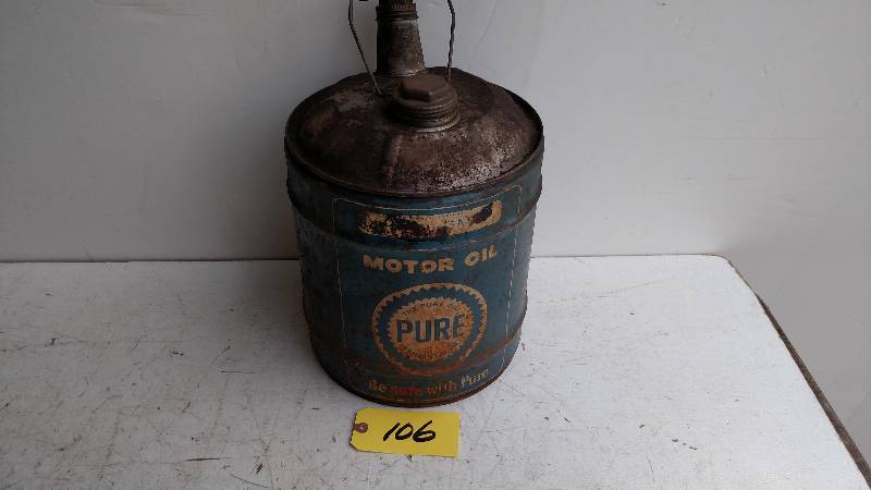lot 106 image: Pure 5 Gallon Oil Can...