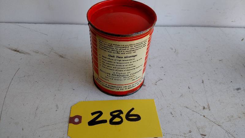 lot 286 image: Phillips 66 1 lb. Grease Can...