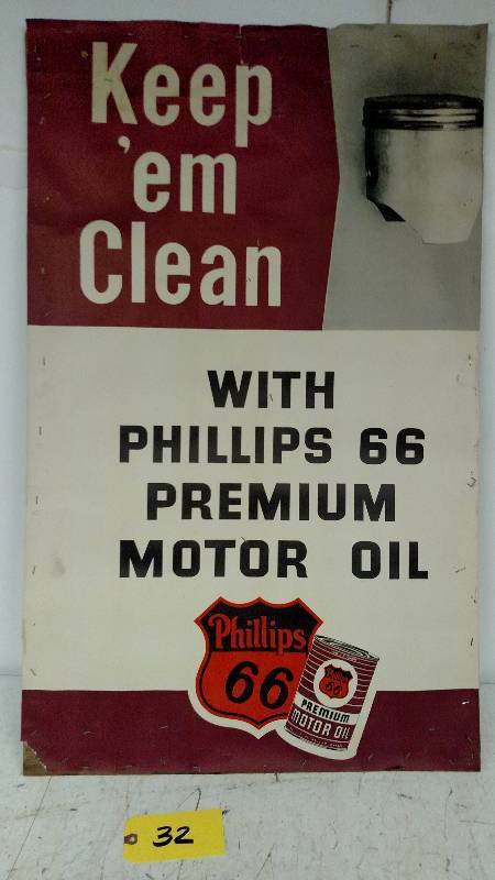 lot 32 image: Phillips 66 Keep Em Dry Paper Sign...