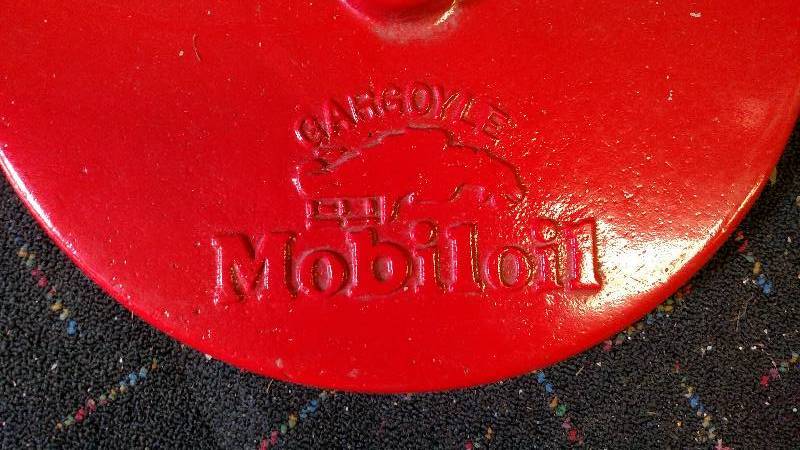 lot 75 image: Mobiloil Gargoyle Cast Iron Sign Ba...