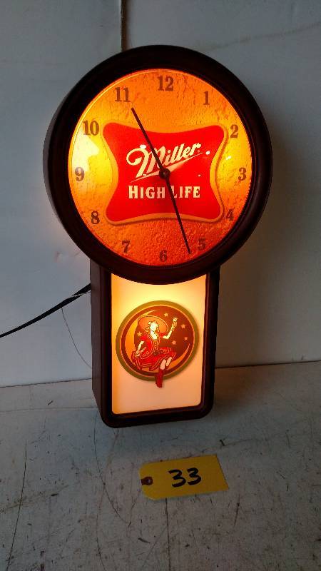 lot 33 image: Miller High Life Clock...