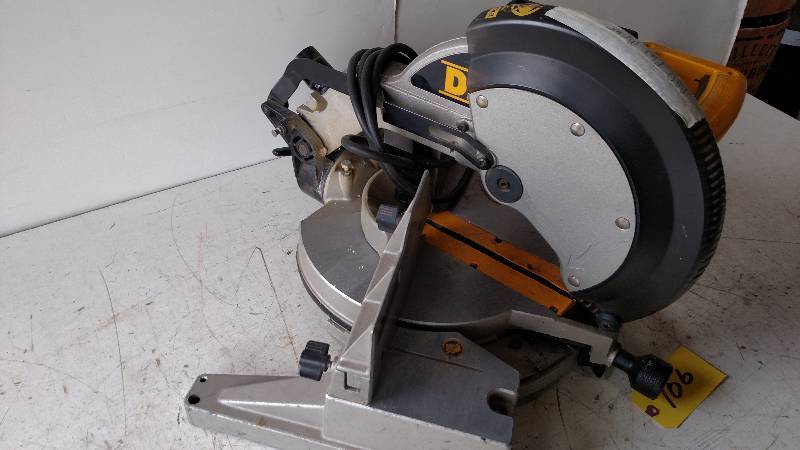 lot 106 image: Dewalt DW705 12 Miter Saw, Bad Mot...