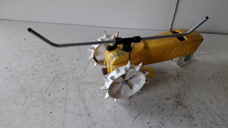 lot 134 image: Cast Iron Traveling Tractor Sprinkl...