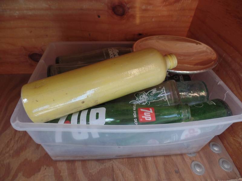 Lawn Sprinkler, Bottles, and Shelf Brackets