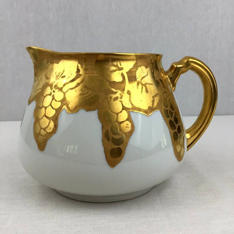 lot 057 image: Wow Wm Gurin & Co Limoges France Gold Cider Pitcher Artist Signed E. Hickerson 1913 W. G. & Co White with Embossed Gold Grapes