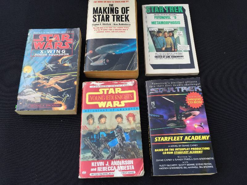 Vintage Star Trek and Star Wars books including the Nitpickers Unofficial Guide to Star Trek Next Generation