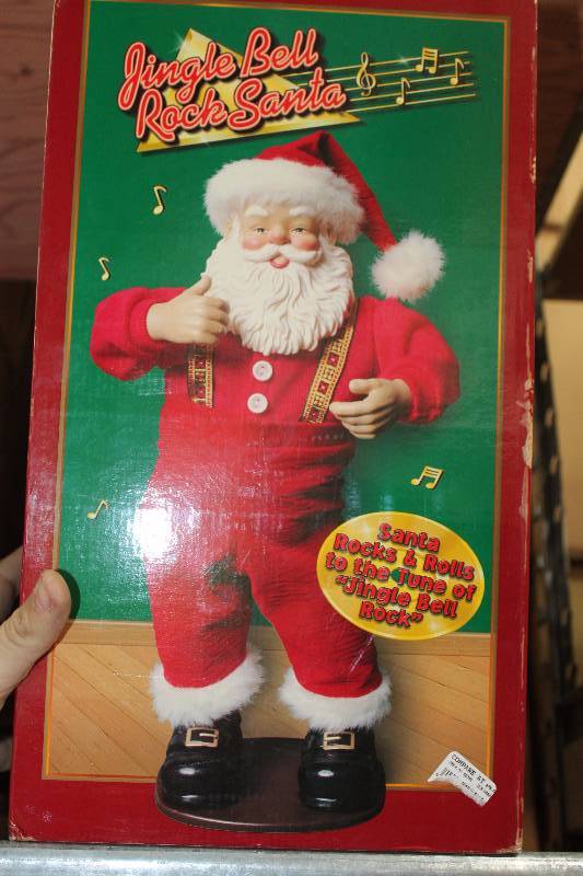 Jingle Bell Santa Claus Dancing Figurine IN Box.