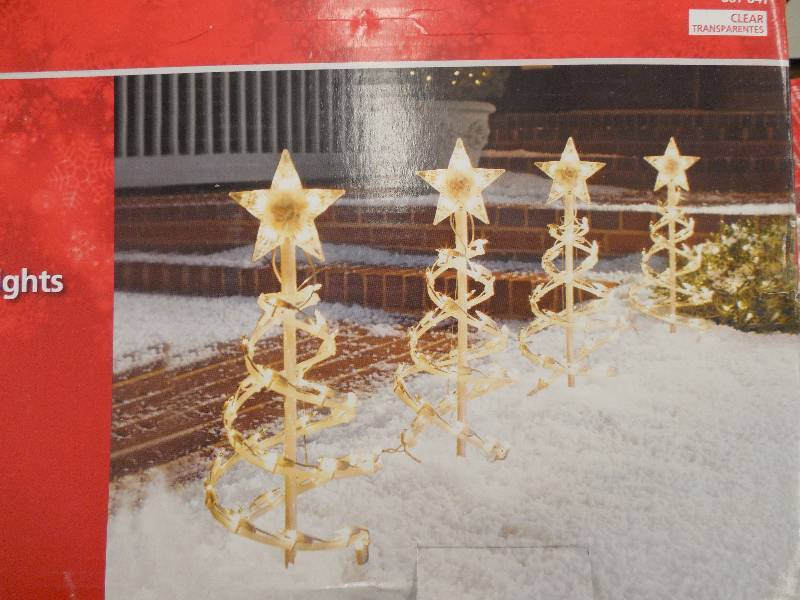 lot 27 image: 18 in. Clear Spiral Tree Pathway Lights (Set of 4)