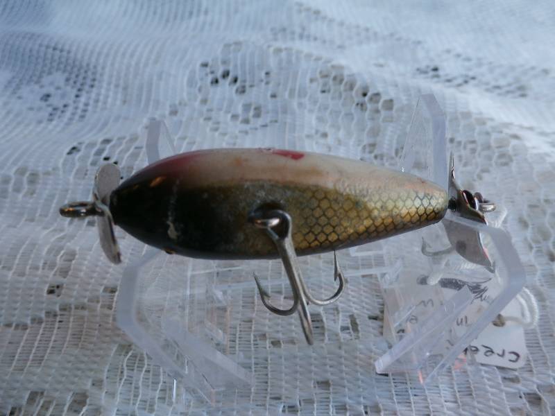 lot 38 image: CREEK CHUB BAIT CO. Injured minnow.