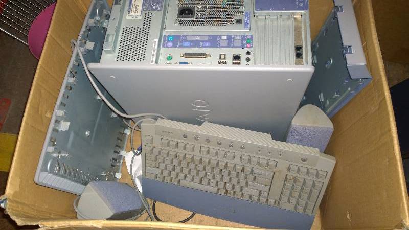 Computer tower, keyboard and speakers