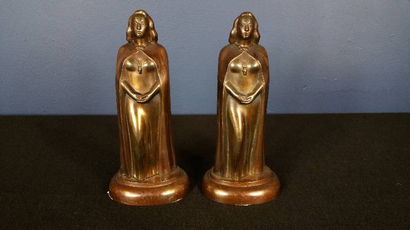 lot 21 image: A Pair of Vintage Brass Sculptures