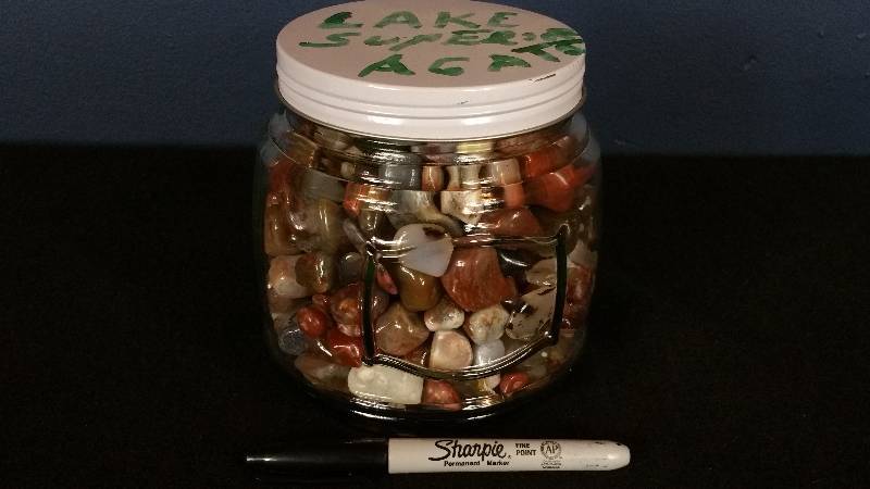 lot 25 image: Jar Full of Polished Lake Superior Agates