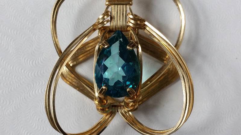 lot 37 image: Large Blue Green Topaz in Designer Setting