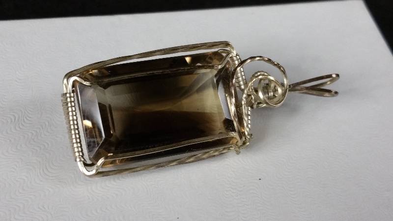 lot 40 image: Cut Smoky Quartz in Sterling Silver