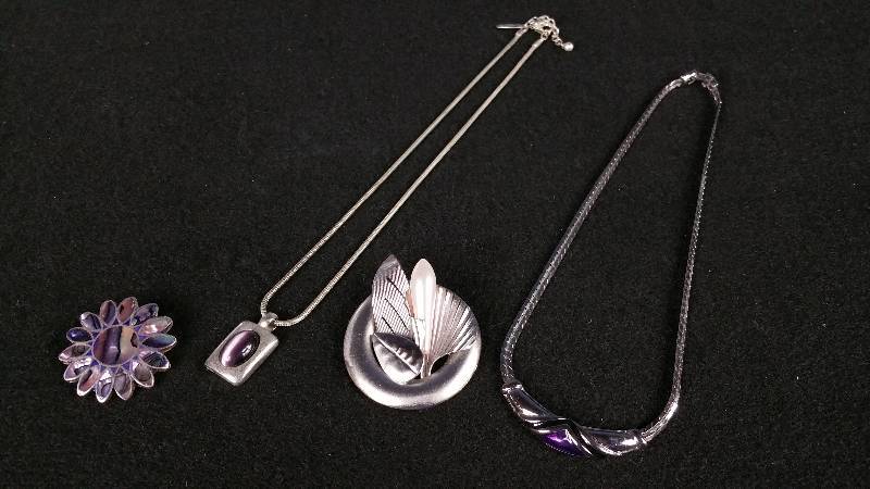 lot 63 image: NY & CO Purple Tigers Eye  More