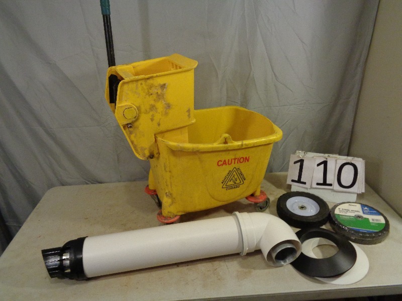 lot 110 image: Mop Bucket with Wringer and Tankless Water Heater Vent