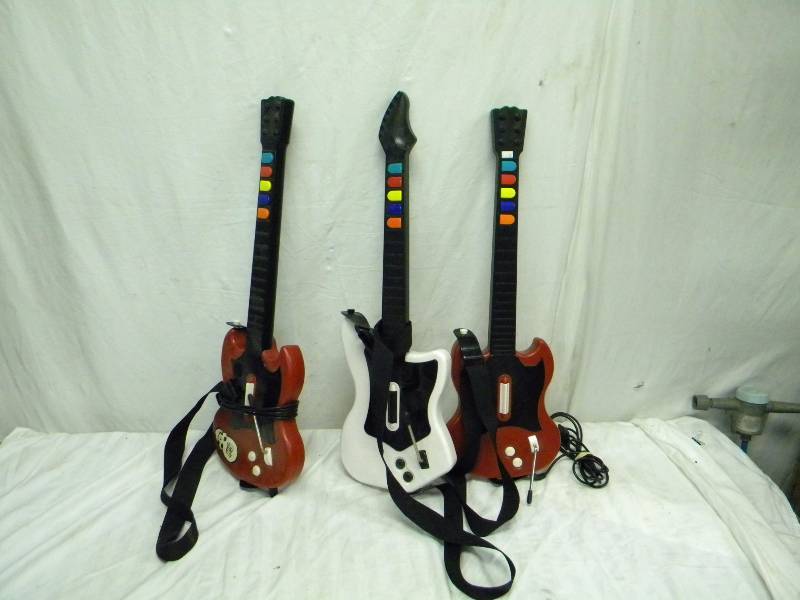 lot 326 image: Playstation Guitars