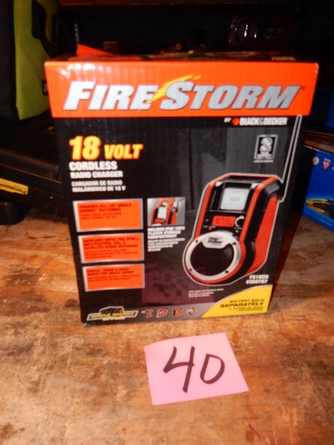 lot 40 image: Black and Decker, 18 Volt Cordless Radio Charger.. Battery included, but charger sold separately