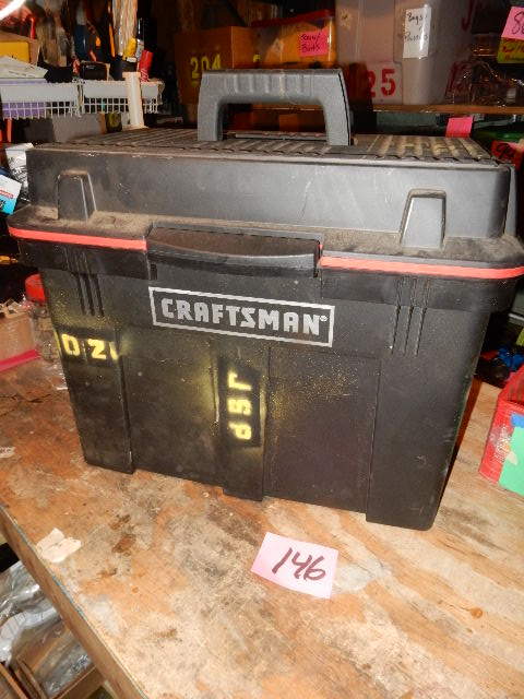 lot 146 image: CRAFTSMAN Plastic tool box with telescoping handle.. Approx 24 in x 14 in x 20 in h.. Handle pulls to 37in.. Nice shape
