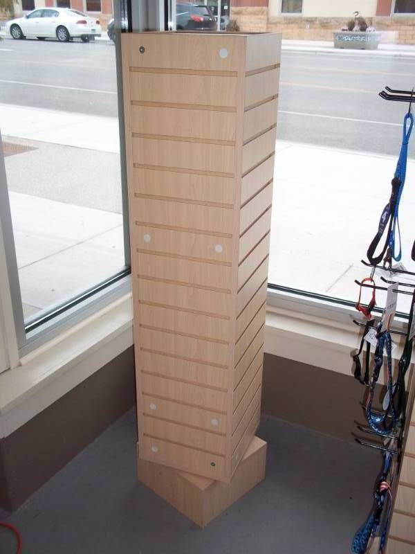 lot 1 image: Revolving Display Cabinet 12 X 12 X 55 inches high