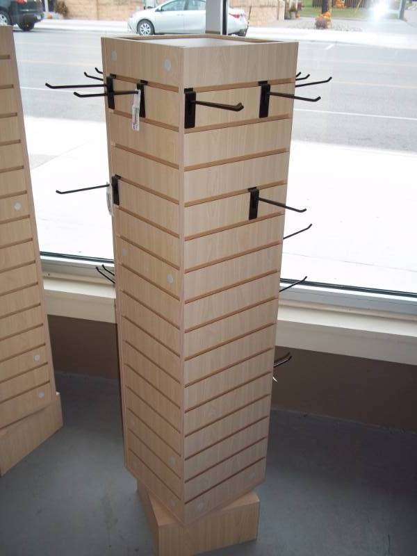 lot 15 image: Revolving Display Cabinet 12 X 12 X 55 inches high