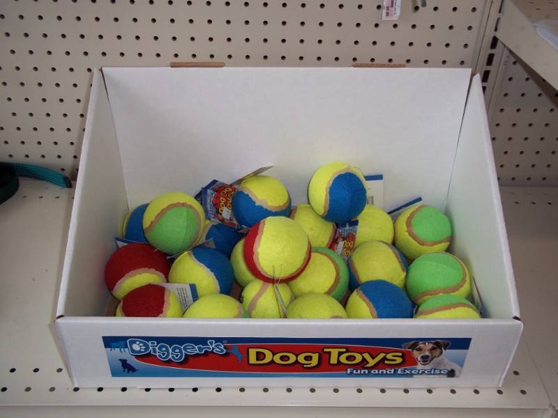 lot 16 image: Large Box Dog Toy Balls