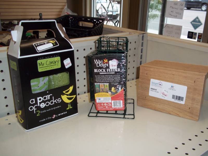 lot 37 image: Small Wren House, Block Feeder, 2 - Thistle Sock Feeders