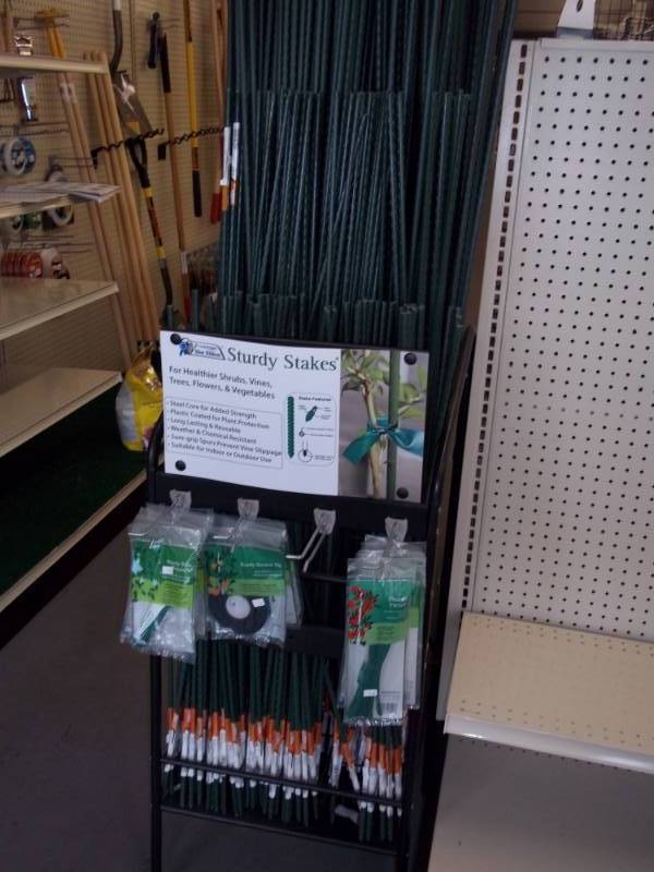 lot 42 image: Display of Sturdy Stakes, includes stand and accessories