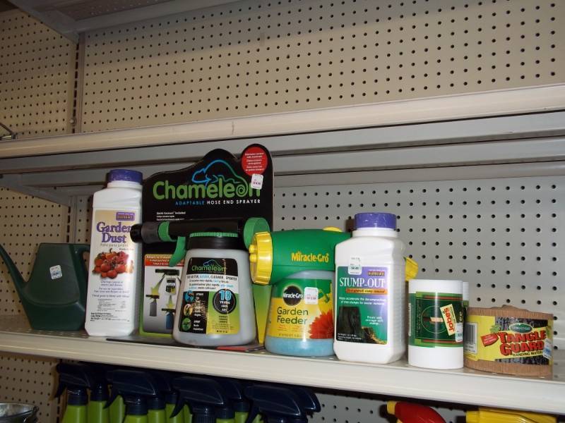 lot 78 image: One 4 ft Shelf Lot of Outdoor Plant Supplies