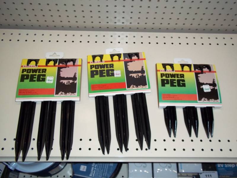 lot 122 image: Lot of 3 Packages of Plastic Tent Stakes