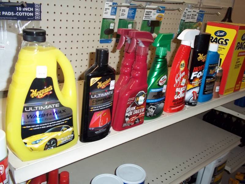 lot 156 image: Shelf Lot includes auto cleaner, Rainex, wheel cleaner, oil can