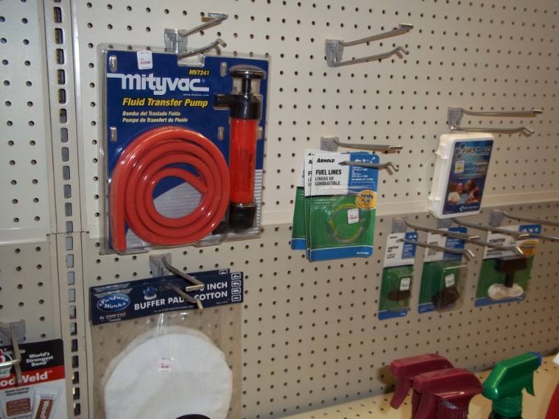 lot 157 image: ALL Lot includes Fluid Transfer Pump, Buffer pad, Small Engine parts, First aid kit