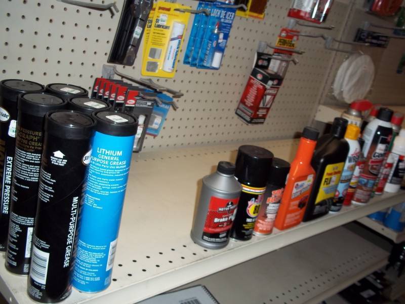 lot 171 image: Shelf Lot includes Grease, Starting Fluid, JB 80