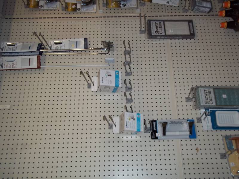 lot 186 image: 4 ft Shelf Wall Lot includes Shower Curtains, Towels Bars, etc
