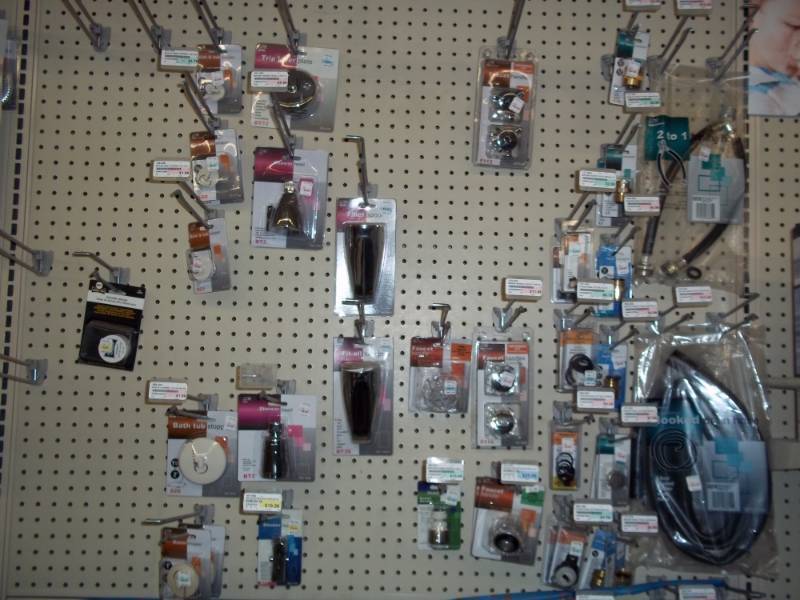 lot 217 image: Wall Shelf Lot Top Half includes Misc Tub and Shower Parts