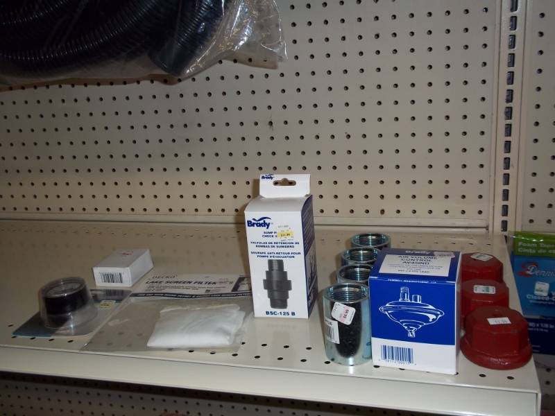 lot 250 image: 4 ft Shelf Lot includes sump pump check valve, Wayne Pressure Valve, etc
