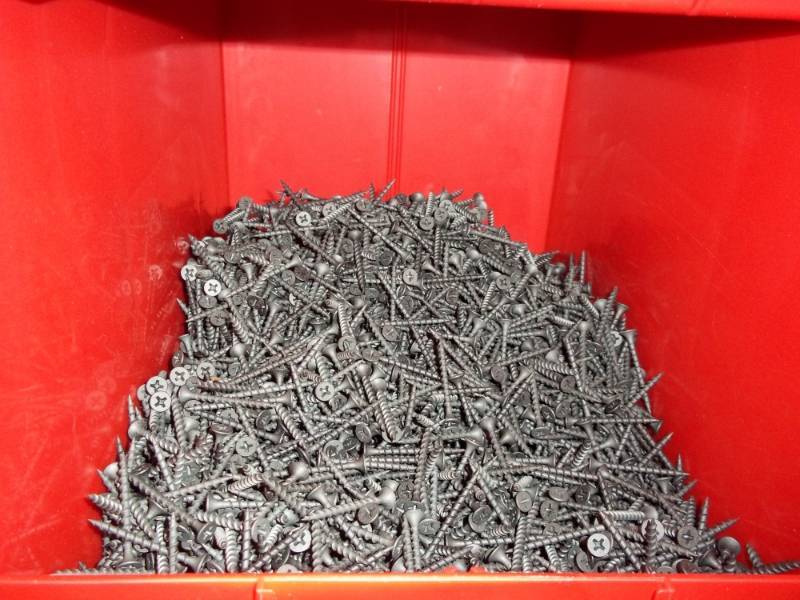 lot 289 image: Red Stacking Bin Full of Sheet Rock Screws 1 58 in