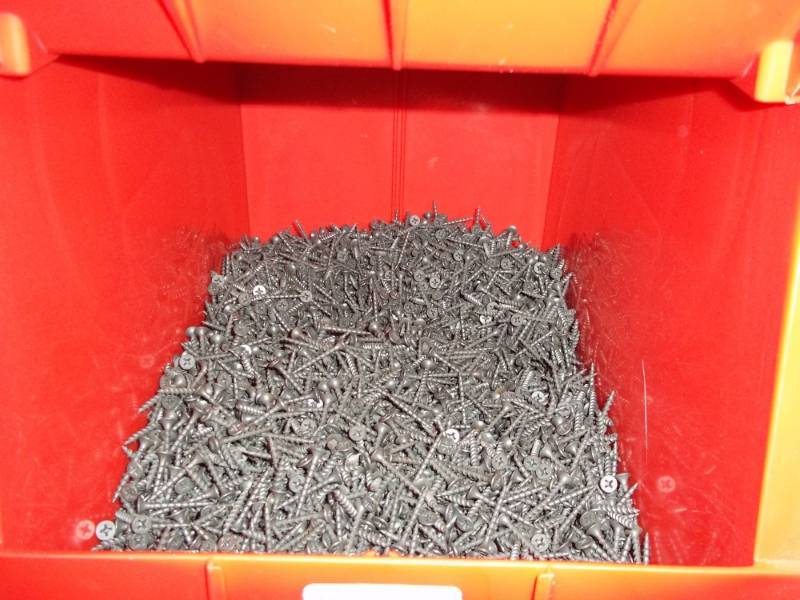 lot 290 image: Red Stacking Bin Full of Sheet Rock Screws 1 14 in